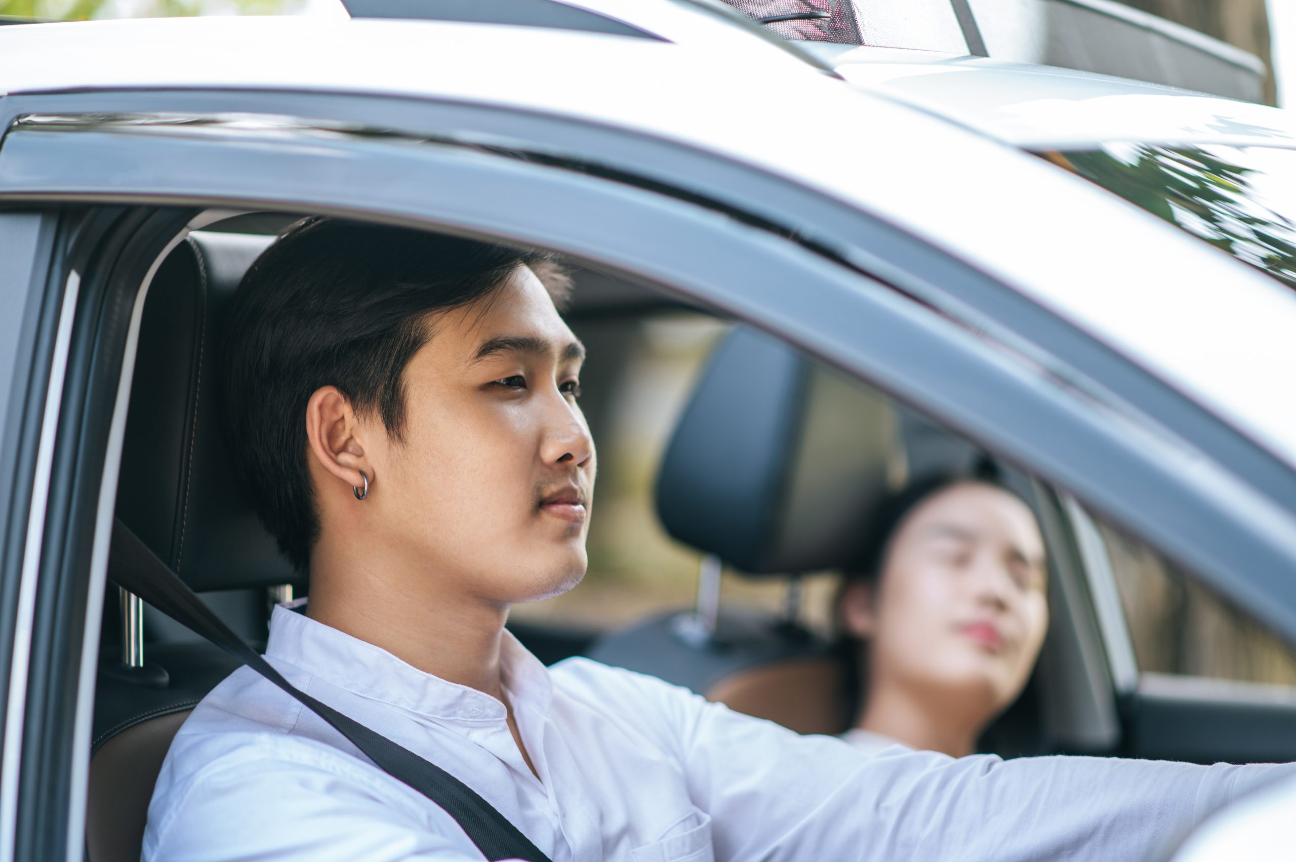 Women and men sit in cars and are stressed. selective focus.